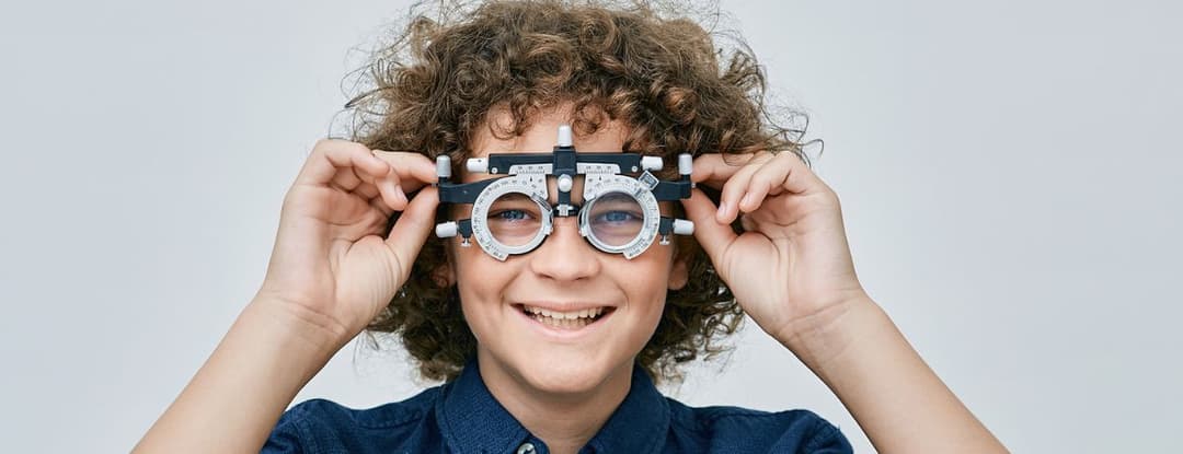 kid getting his vision checked